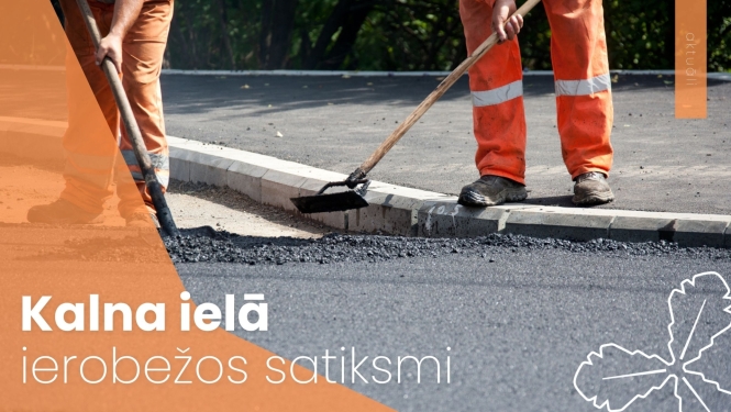 ceļa strādnieki ieklāj asfaltu