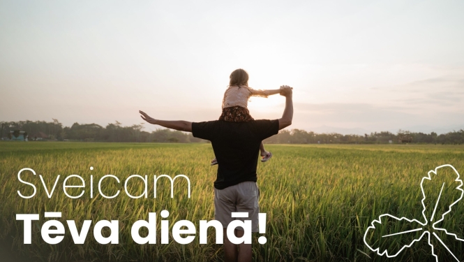 tēvs ar meitu pļavā