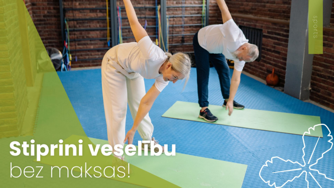 cilvēki vingro uz paklājiņiem